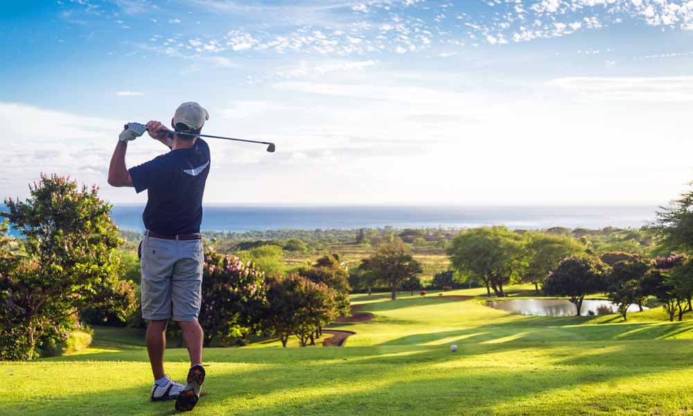 “Golfer playing on a Marbella golf course with sea views, representing the best golf courses in Marbella.”